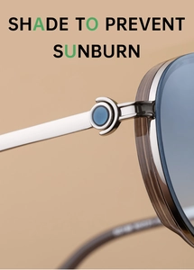 Detail of silver metal frame sunglasses with light blue lenses and blue temple accents