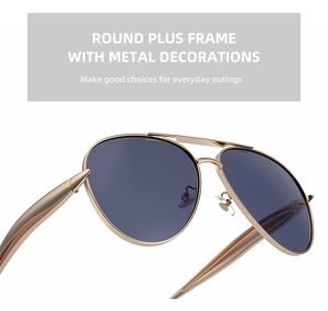 Detailed close-up of pilot style gold metal frame sunglasses with blue-purple lenses