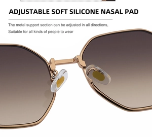 Détails des plaquettes de nez en silicone souple et de la monture dorée des lunettes de soleil