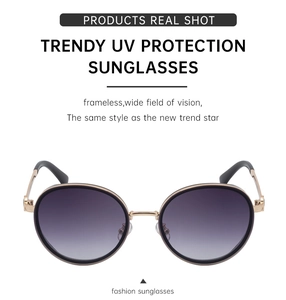 Detailed view of punk round sunglasses with UV-protected purple gradient lenses