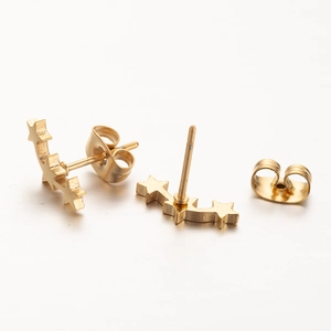 Minimalist gold star stud earrings with three-star curved design on white background