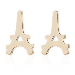 Detailed macro view of gold Eiffel Tower stud earrings with polished geometric cutouts