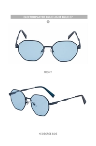 Lunettes de soleil polygonales en métal bleu avec branches ondulées et verres dégradés