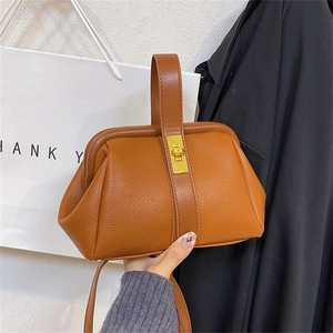Caramel lychee grain leather shell bag with gold hardware and single handle for women