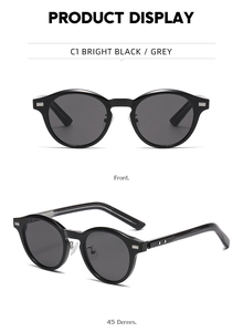 Détail de lunettes de soleil rondes vintage avec monture noire et rivets argentés