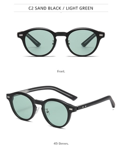 Vues de face et à 45 degrés de lunettes de soleil rondes noir sablé avec verres verts