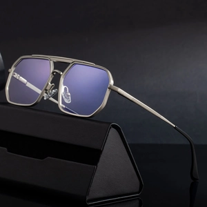 Lunettes de soleil vintage polygonales en métal gris fusil avec verres bleus