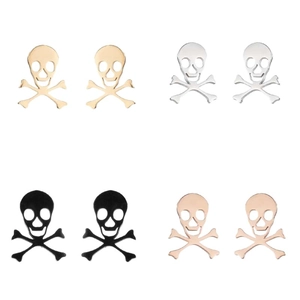 Skull and crossbones stud earrings set in gold, silver, black, and rose gold finishes
