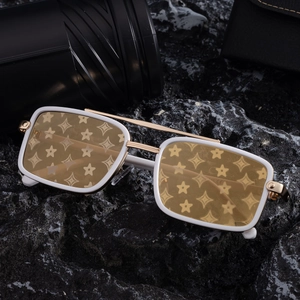 Polarized square sunglasses with monogram lenses and gold metal accents on black rock