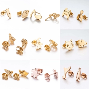 Various themed stainless steel stud earrings including ghost, planet and music note shapes