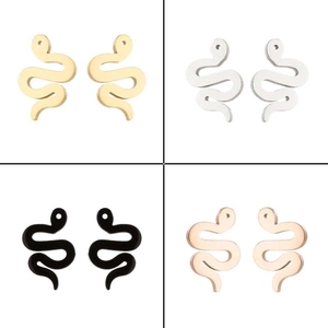 Detail view of snake-shaped earring charms in gold, silver, black, and rose gold finishes