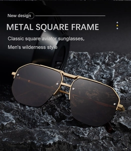 Close-up of golden metal square pilot sunglasses with double bridge on black rock