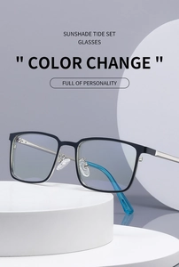 Detail view of square frame glasses with silver metal temples and blue accents