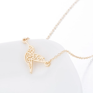 Elegant gold hollow origami hummingbird necklace with delicate cross chain for women