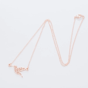 Detail of rose gold hummingbird pendant with hollow pattern and lobster clasp