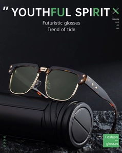 Detail of tortoise shell frame and gold metal rim on vintage square sunglasses