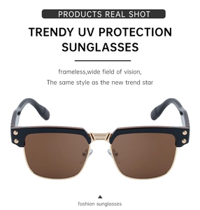 Detail showing retro semi-rimless frame with golden metal bridge and UV lenses