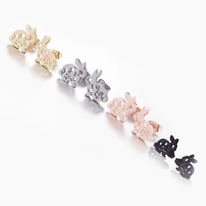 Detailed view of laser-cut rabbit stud earrings in gold, silver, rose gold and black colors
