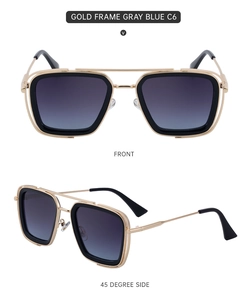 Detail of square vintage sunglasses with gold frame, double bridge, and gray blue lenses