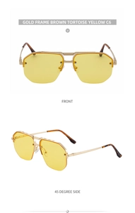 Detail view of gold metal sunglasses with yellow lenses and tortoise temple tips