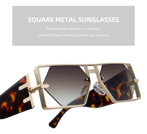 Detail einer goldenen Metall-Sonnenbrille mit braunem Verlauf und Bügeln in Schildpattoptik