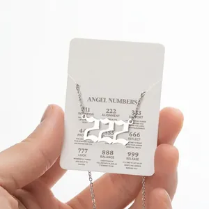 Silver angel number 222 necklace on an informative Alignment display card