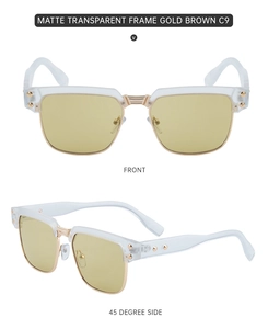 Detail of matte transparent half-frame sunglasses with gold metal trim and brown lenses