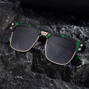 Square polarized sunglasses with marble pattern frame and gold metal bridge on dark rock