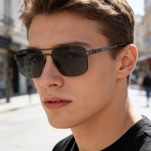 Close-up of polarized square nylon sunglasses with metal double bridge on a male model