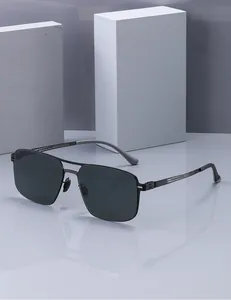 Close-up of square polarized sunglasses with black metal frame and double bridge