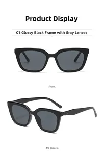 Vue de face et à 45 degrés de lunettes de soleil œil-de-chat noires à verres polarisés
