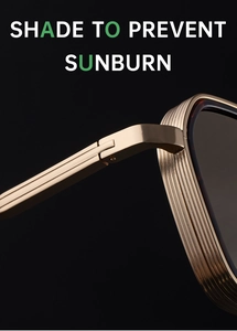 Detailed macro view of premium golden metal hinge on designer square sunglasses