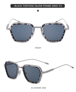 Detail of square black tortoise and silver sunglasses with gray lenses and metal temples