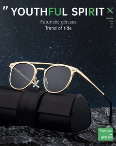 Detailed view of gold metal frame sunglasses with black lenses on a leather case