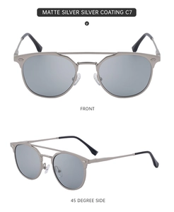 Detailed view of matte silver metal sunglasses with spring hinges and silver coated lenses