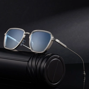Classic square metal sunglasses for men with silver frames and light blue lenses