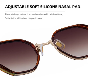 Detail of adjustable soft silicone nose pads and golden metal bridge on vintage sunglasses