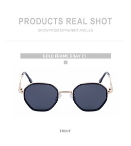 Front view of gold hexagonal metal sunglasses with dark gray lenses and black tips