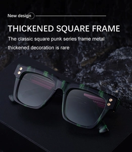 Macro shot of thickened square frame sunglasses with green marble texture and gold studs