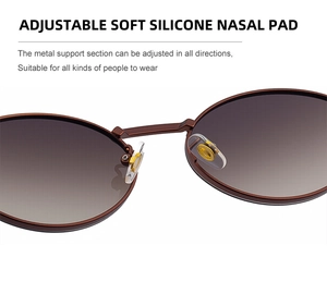 Close-up of adjustable soft silicone nose pads on oval metal frame sunglasses