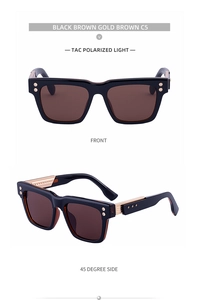 Detail view of square polarized sunglasses with C5 black frame and gold metal accents