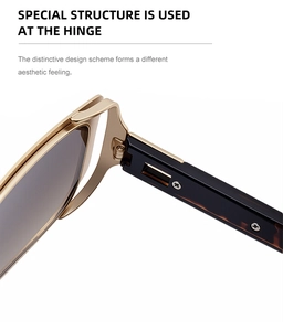 Detailansicht des Metallscharniers und der Schildpatt-Bügel dieser eckigen Sonnenbrille