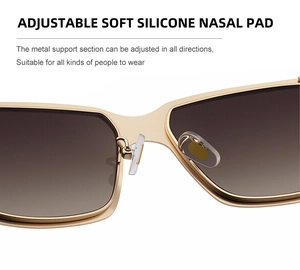 Makroaufnahme verstellbarer weicher Silikon-Nasenpads an goldener Sonnenbrille