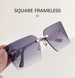 Close-up of square rimless sunglasses featuring purple gradient lenses and silver metal hinges