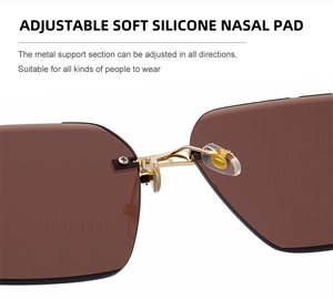 Close-up of adjustable soft silicone nose pads on gold metal frame sunglasses