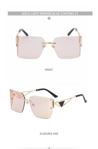 Detail of rimless sunglasses with blue coating lens and gold metal temples