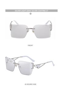 Detail of silver rimless sunglasses with square lenses and triangle cutout temples