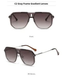Detail view of double bridge pilot sunglasses with gray frames and gradient lenses