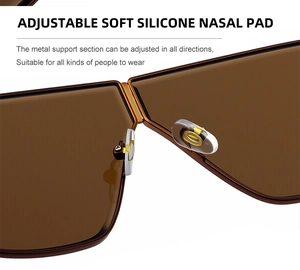 Close-up of adjustable soft silicone nose pads and golden metal support on sunglasses