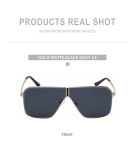 Detail shot of gold metal frames and matte black lenses on square sunglasses